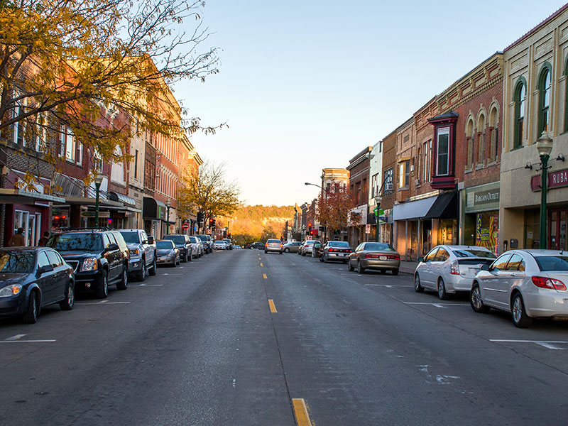 car parked along a street in downtown Decorah