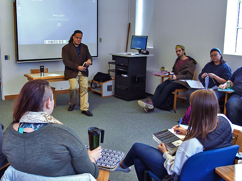 a Luther professor leading a class discussion