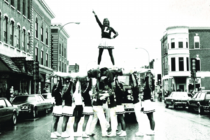 a black and white photo of Luther College cheerleaders from the past