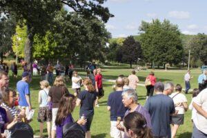 Luther College students and community members outside on campus