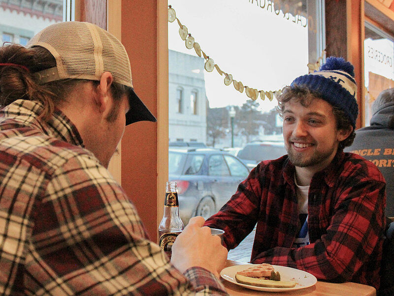 students eat at Oneota Community Co-op
