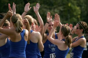 Luther athletes celebrating after an event