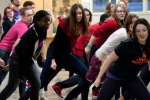 a group of Luther students performing a dance