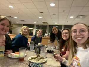 APO members eating dinner together.