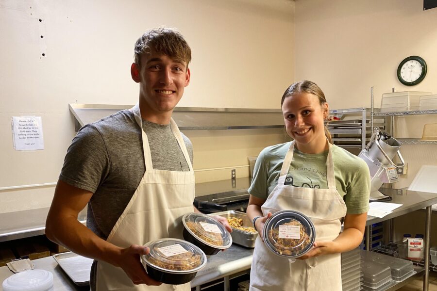 picture of students preparing packaged meals