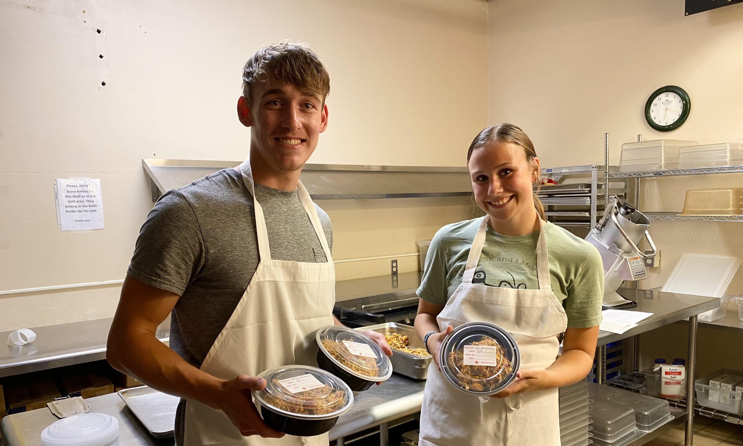 picture of students preparing packaged meals
