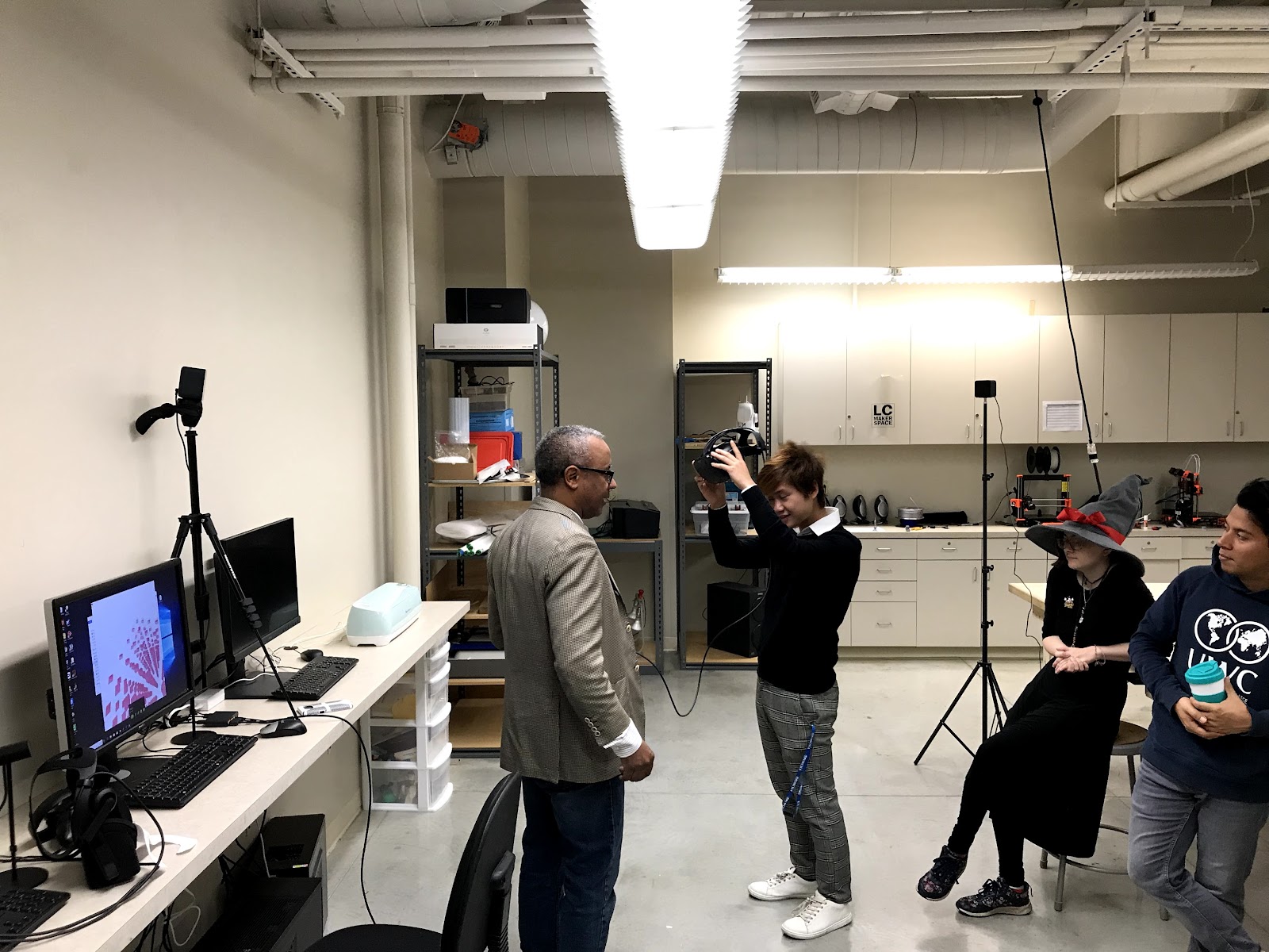 Professor Richard Merritt instructs students on VR programming.