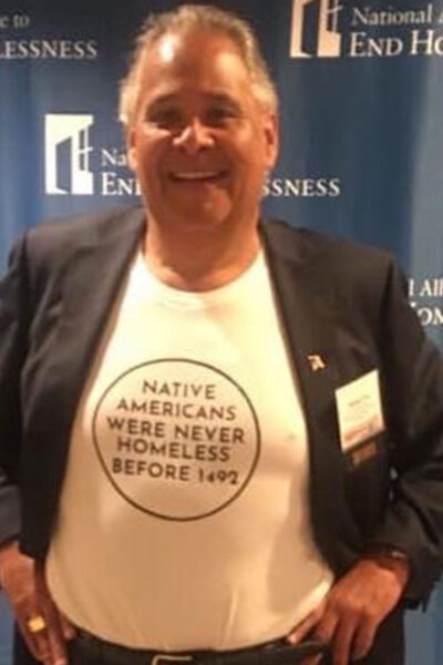 A man wearing a T-shirt that reads