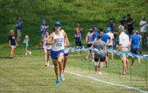 Thomas Altier running for cross country