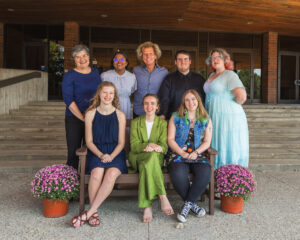 Performing Arts Committee (PAC) members take group photo outside of the Center for Faith and Life