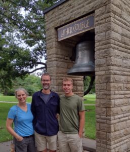 Jenny Kunka and husband, Mike, and son, Ethan in front of Luther Bell.