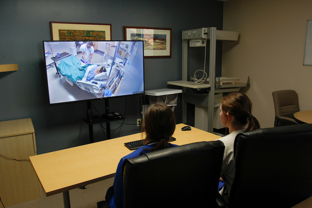 Luther College nursing students watching a video