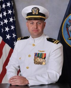 2001 Luther graduate Tory Hegrenes wearing his Navy dress uniform