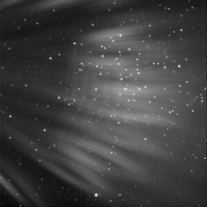 Light rays from the moon blocking the view of stars.
