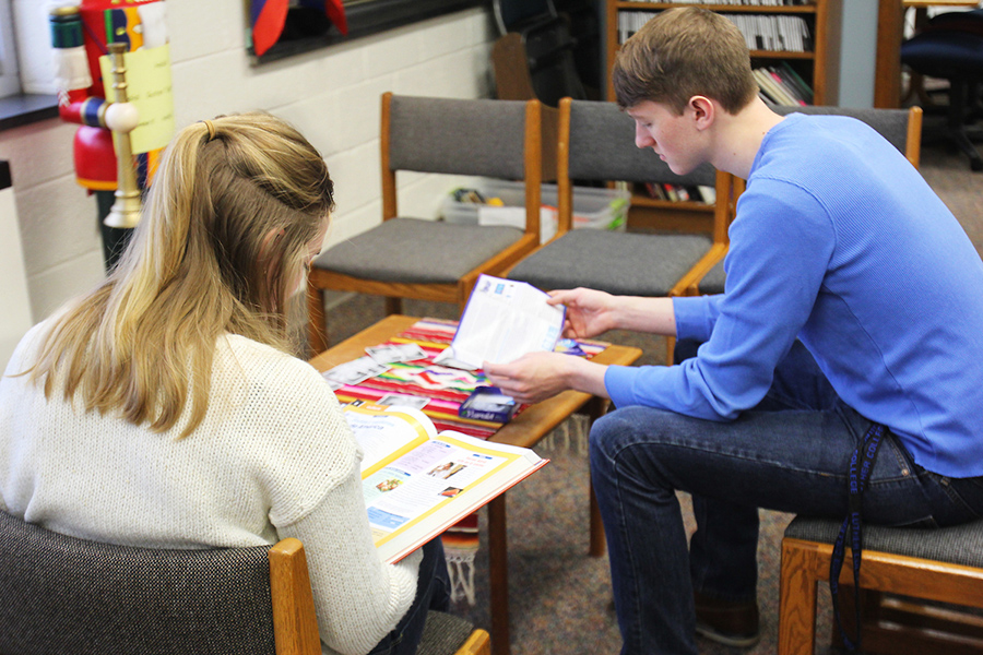 Luther College students reading books in the Language Learning Center.
