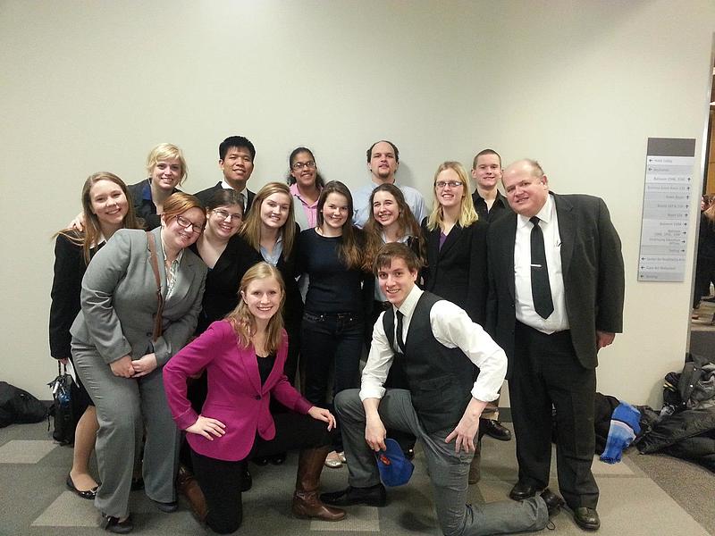 A group of Luther College students and faculty before participating in a mock trial.