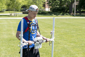 Jay Puffer '18 using the Bartington Grad 601-2 gradiometer during the archaeology field school.