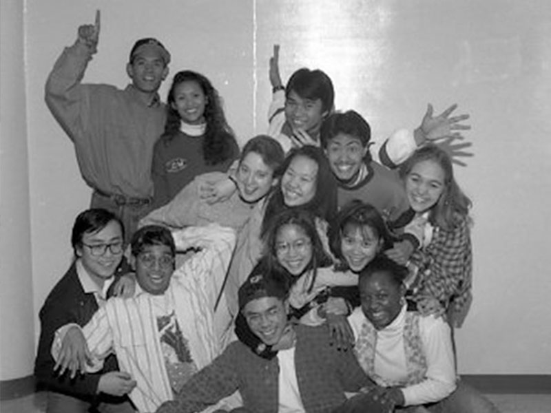 A group of college students posing for the camera