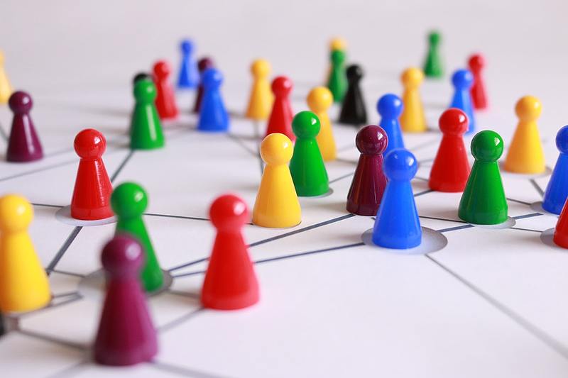 game pieces on a board connected by lines