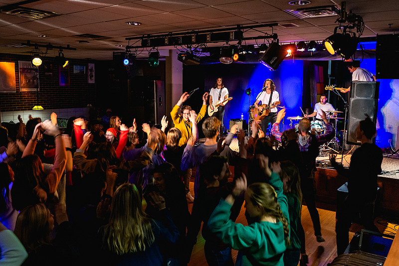 students enjoy a live performance in Marty's