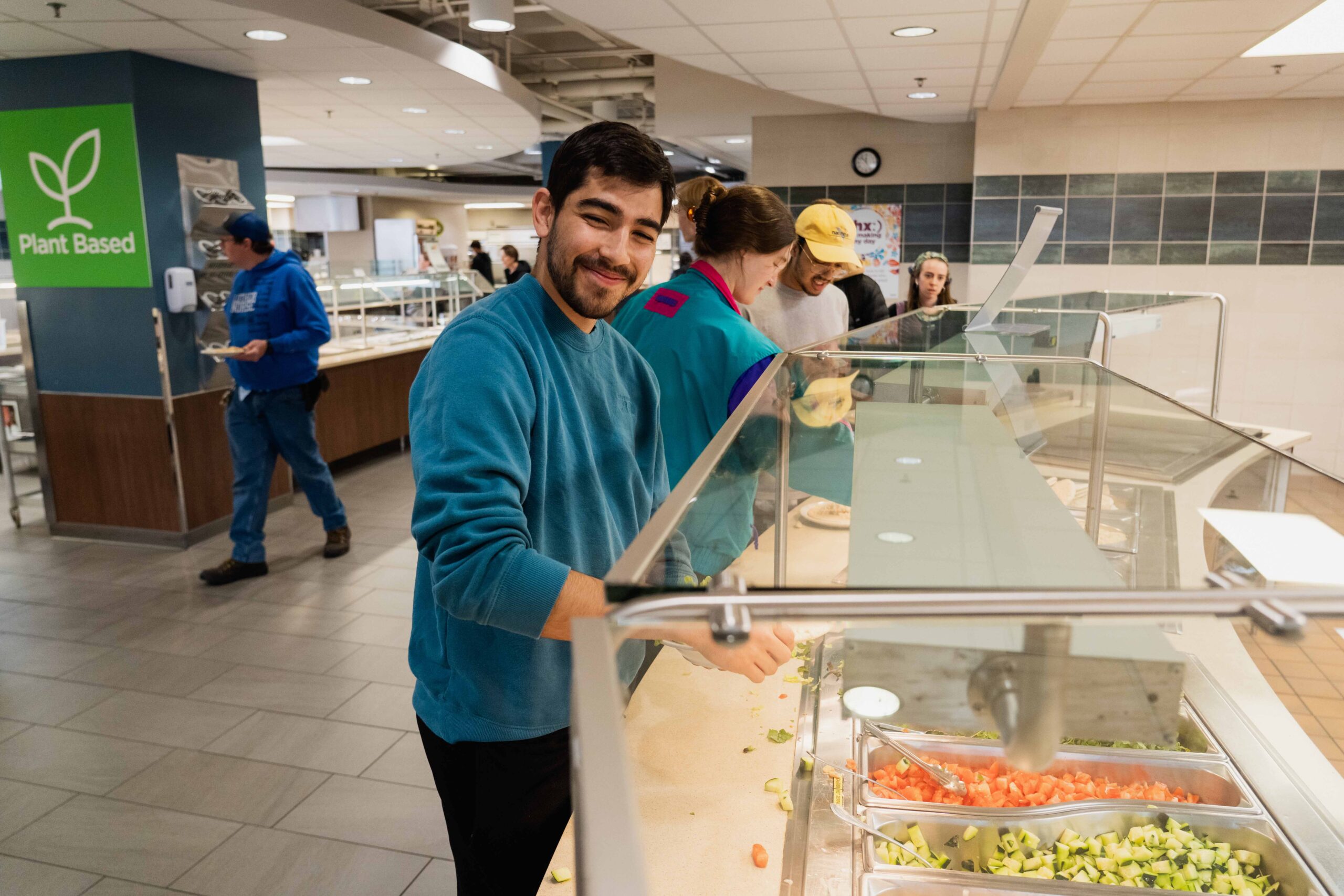 Student serving himself at the buffet line