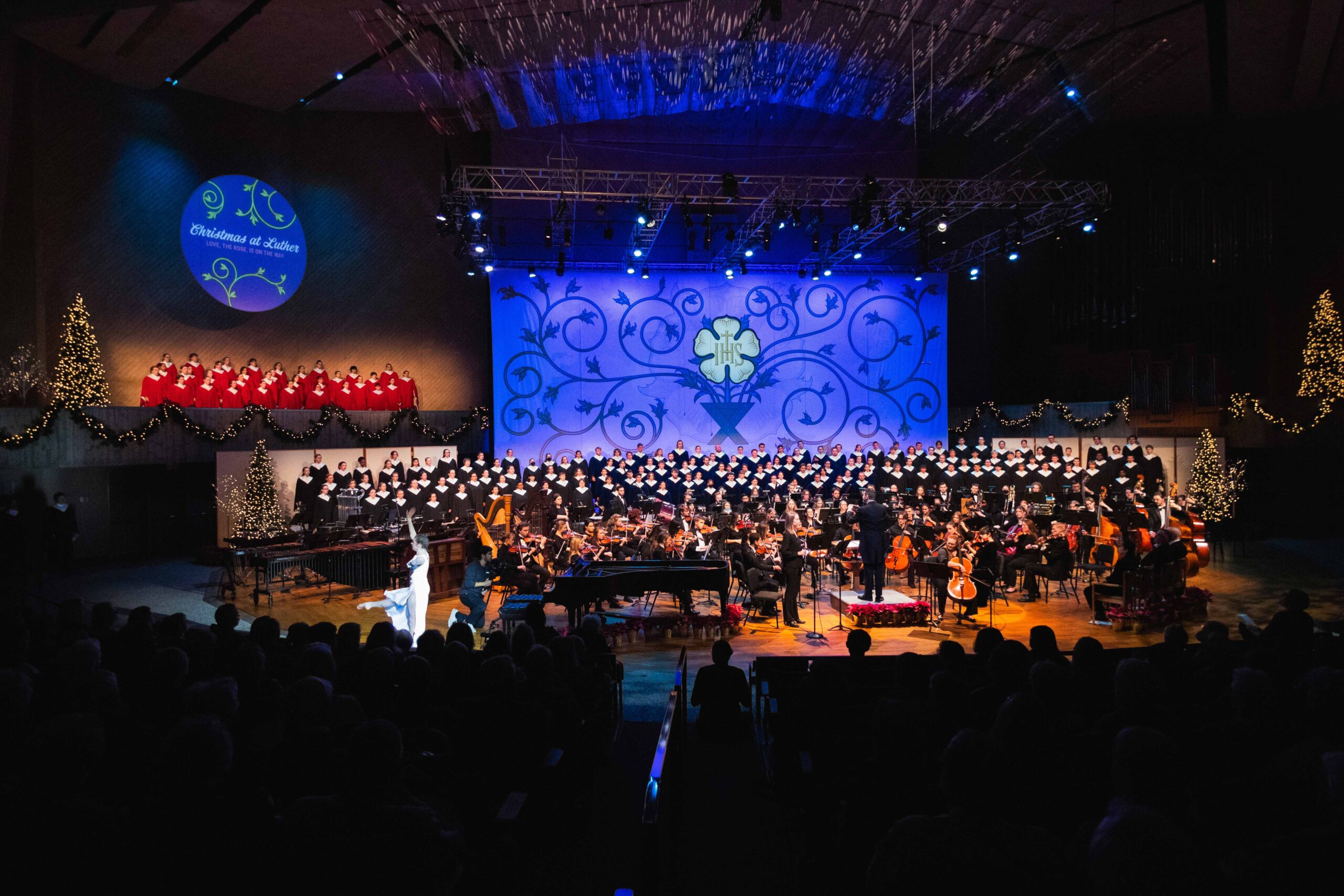 Christmas at Luther wide shot with choir, orchestra, and dancer