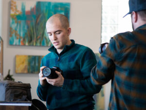 Student looks at a camera