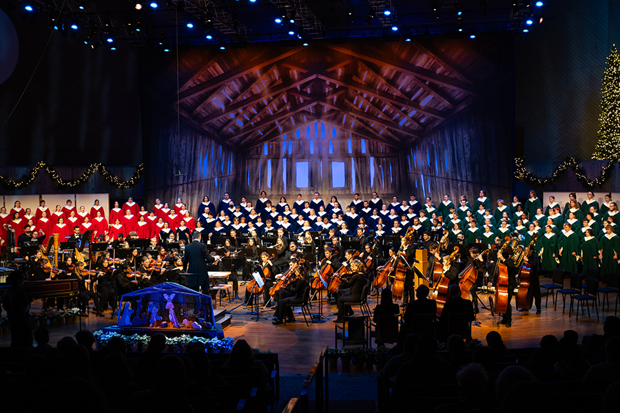Stage setting of Christmas at Luther 2024 shows choirs and symphony orchestra