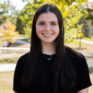 headshot of woman outside