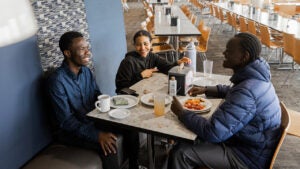 students enjoy breakfast