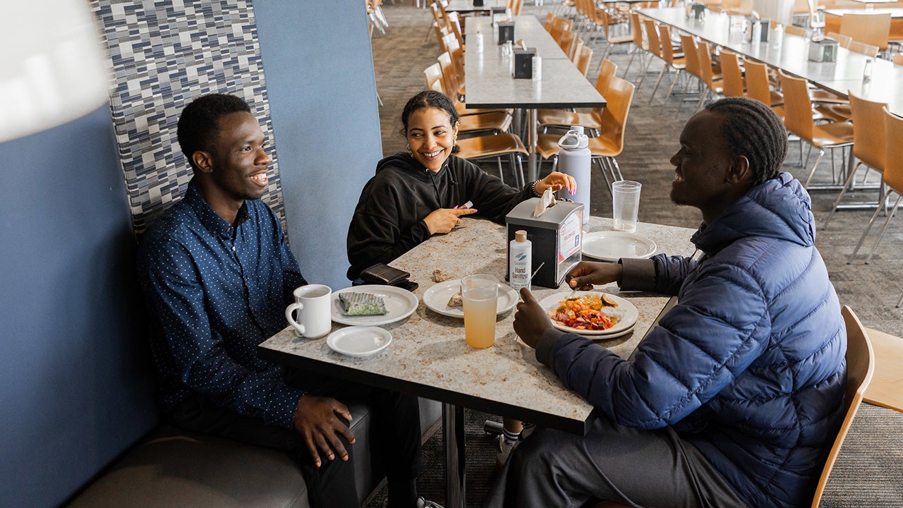 students enjoy breakfast