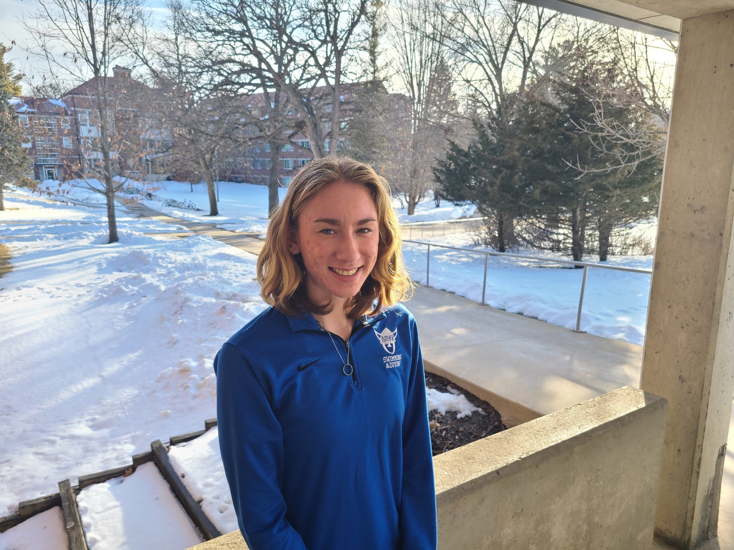 CAE Peer Coach Sam posing outside.