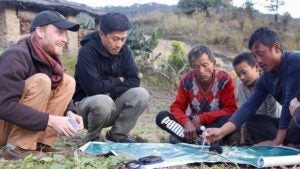 David Hecht (left) and Jigme Tshering with the Royal Society for the Protection of Nature engage in participatory mapping with community partners in Trashi Yangtse, Bhutan.