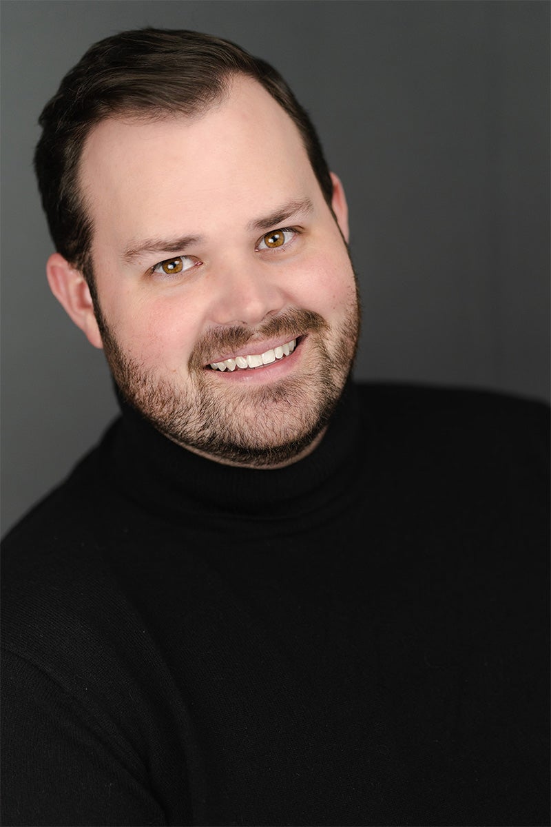 professional headshot of Justin Kroll
