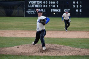 Brody Von Berge throws a baseball during a game at Luther College.