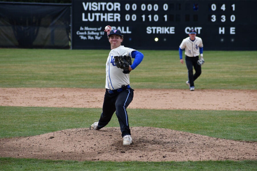 Brody Von Berge throws a baseball during a game at Luther College.