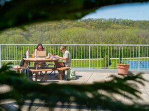 Two students studying outside.