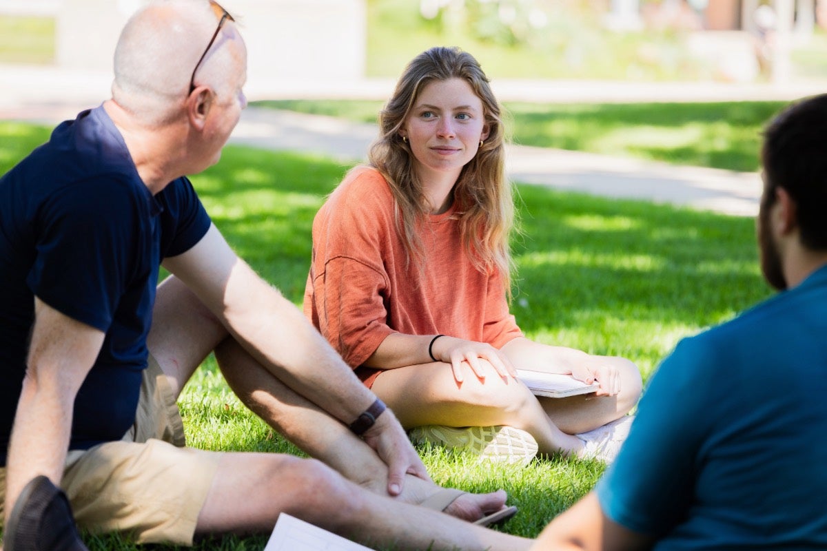 A group of people outside talking